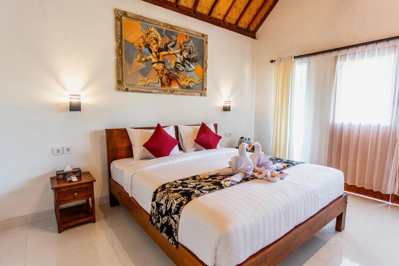 Camar Cottage & Hostel Toyapakeh Bagian luar foto