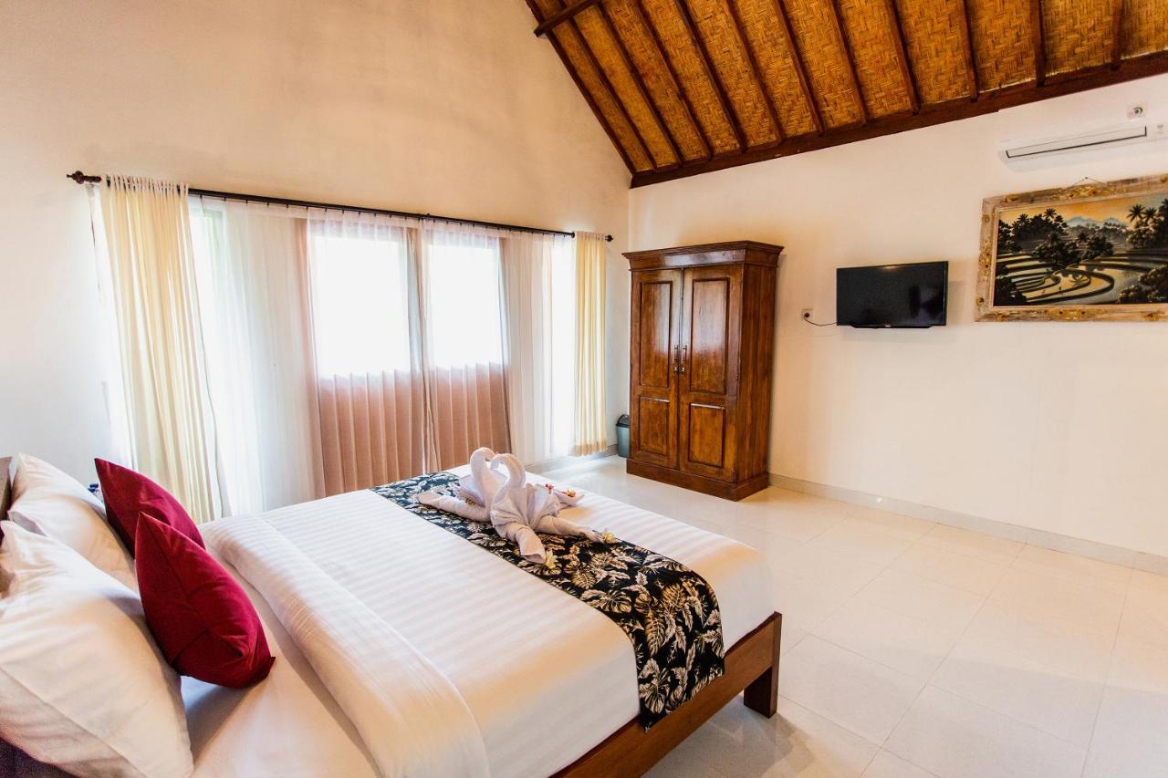 Camar Cottage & Hostel Toyapakeh Bagian luar foto